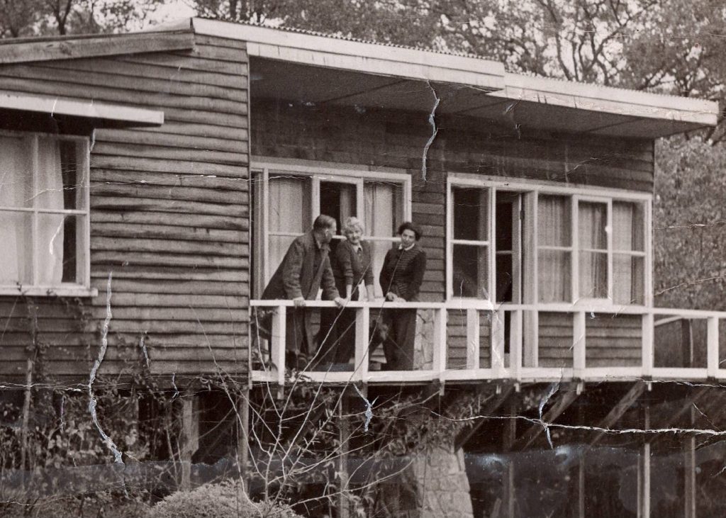 Photo of Dove's cottage with there people standing on balcony